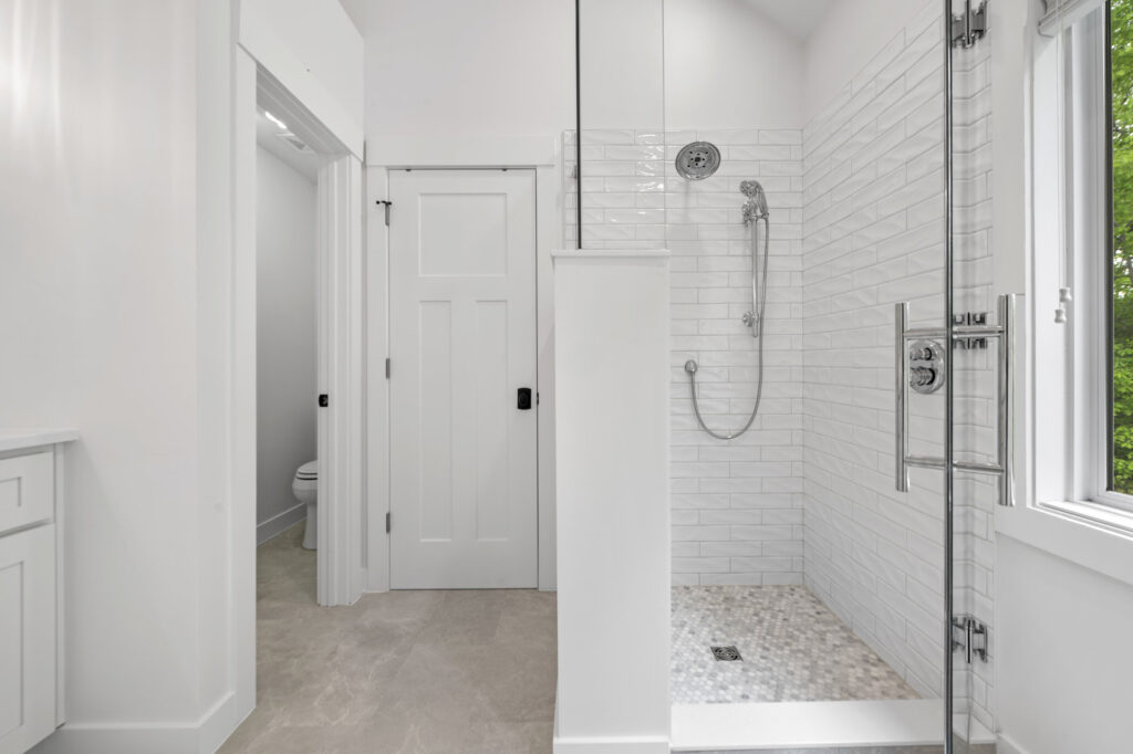 Shower with handheld spray