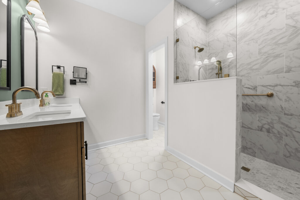 Modern shower and vanity in a renovated bathroom
