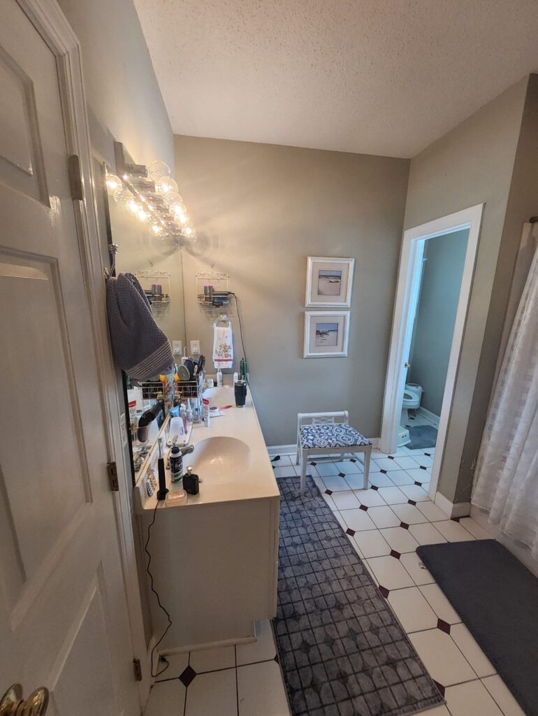 Vanity before master bathroom remodel