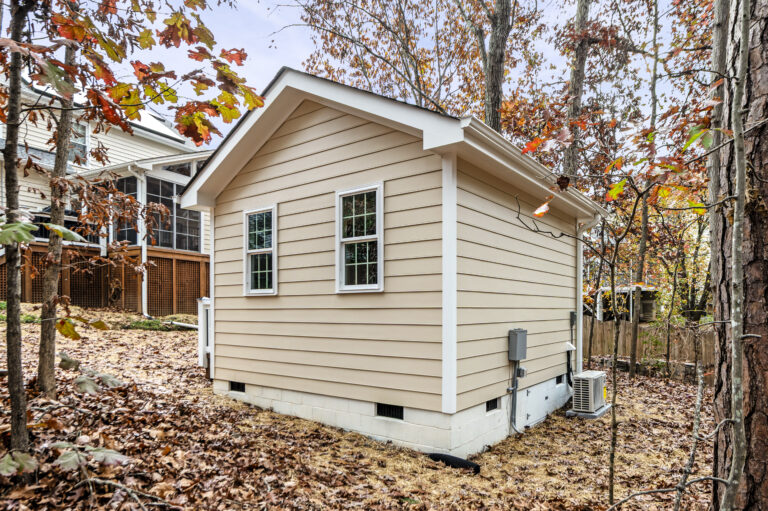 A side and rear view of a detached exterior building to be used as a home office