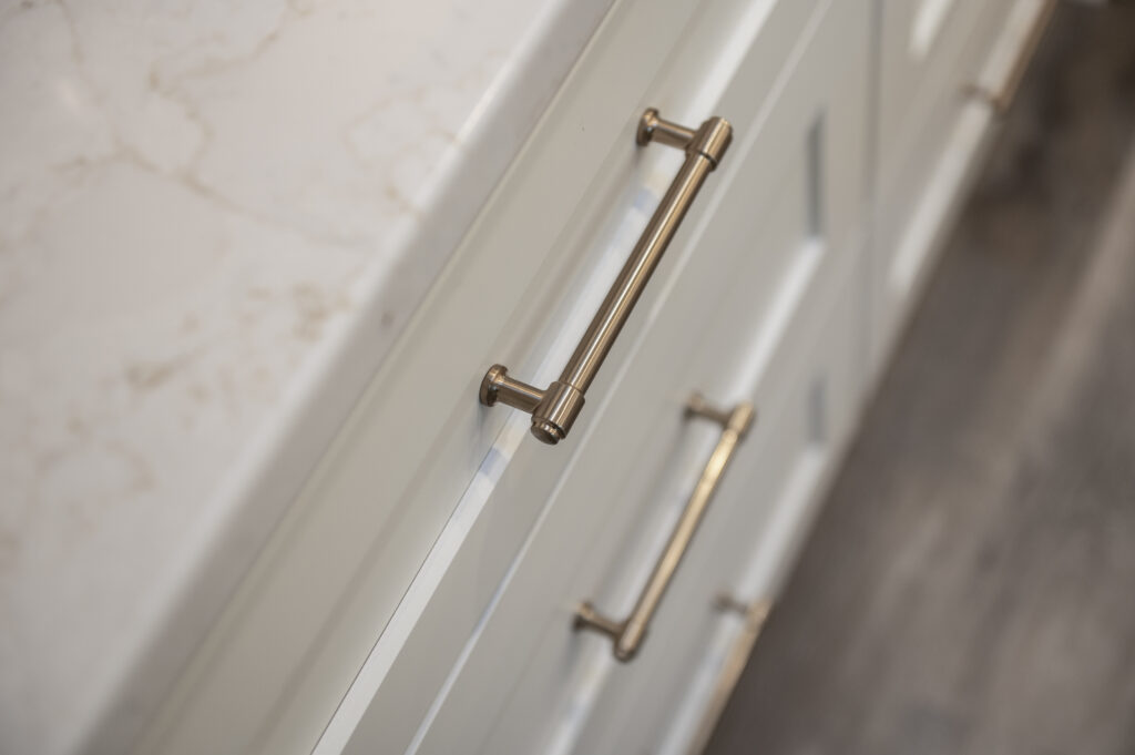 Close up picture of kitchen cabinet with focus on handle