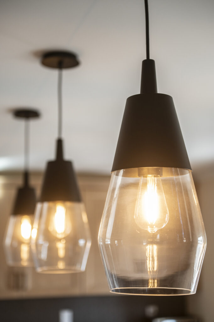 Close up of newly installed pendant lights in a kitchen.