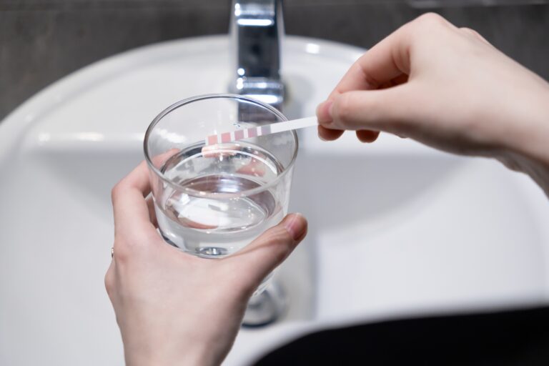 Why Well Filtration is Essential for Your Home. testing water at a faucet