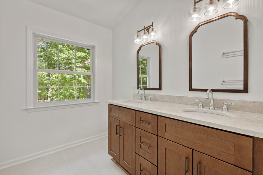 Renovated bathroom with new vanity and new operable window