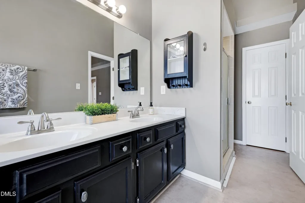 Bathroom before renovation with outdated fixtures