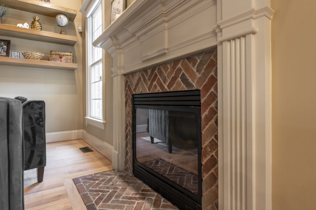 Inviting room focusing on the fireplace